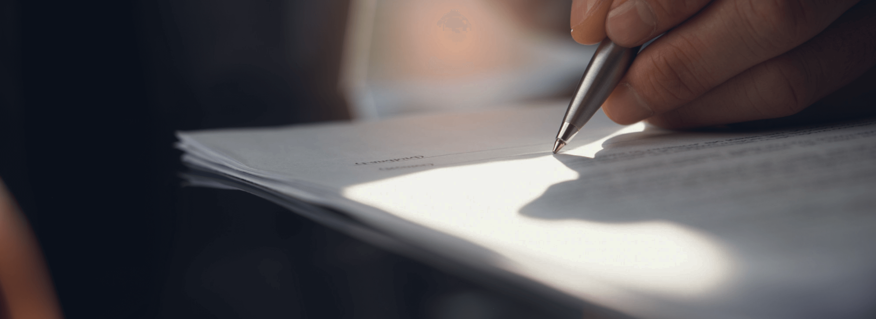 businessman-signing-business-contract-office